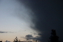 Half and Half, half storm cloud half clear sky